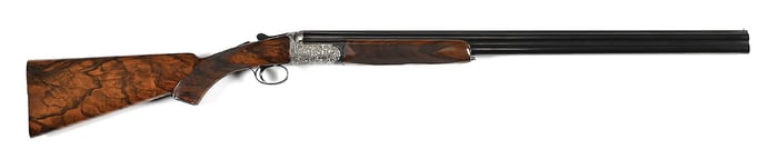 (C) ABBIATICO & SALVINELLI 20 BORE OVER/UNDER SHOTGUN WITH TITANIUM ACTION.