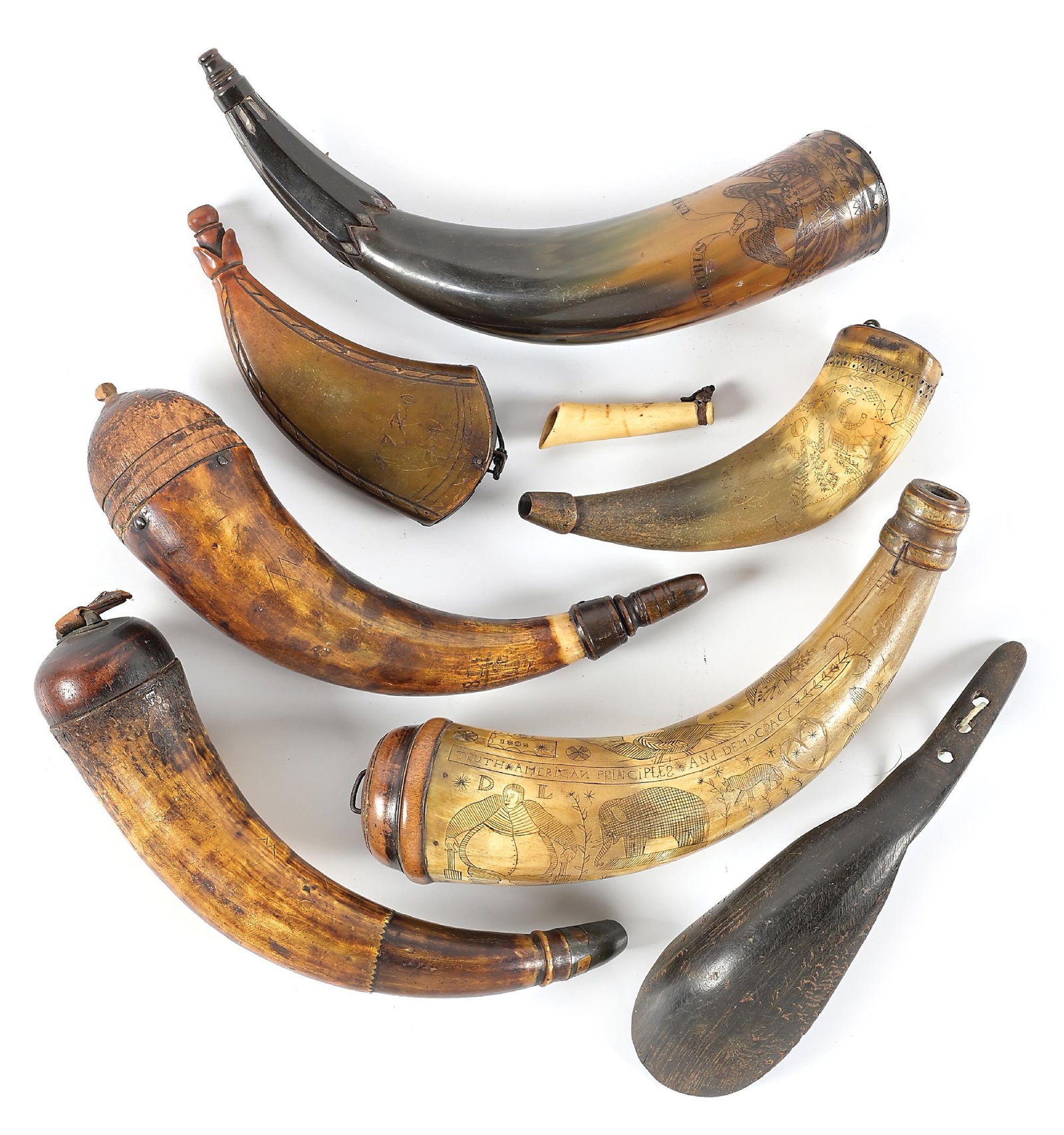 LOT OF 8 POWDER HORNS AND LARGE HORN SPOON.: This lot includes one horn engraved with a professionally executed American eagle and with silver inlays on spout section. Another is dated 1838 and is inscribed "TRUTH - AMERICAN PRINCIPLES - AND DEM