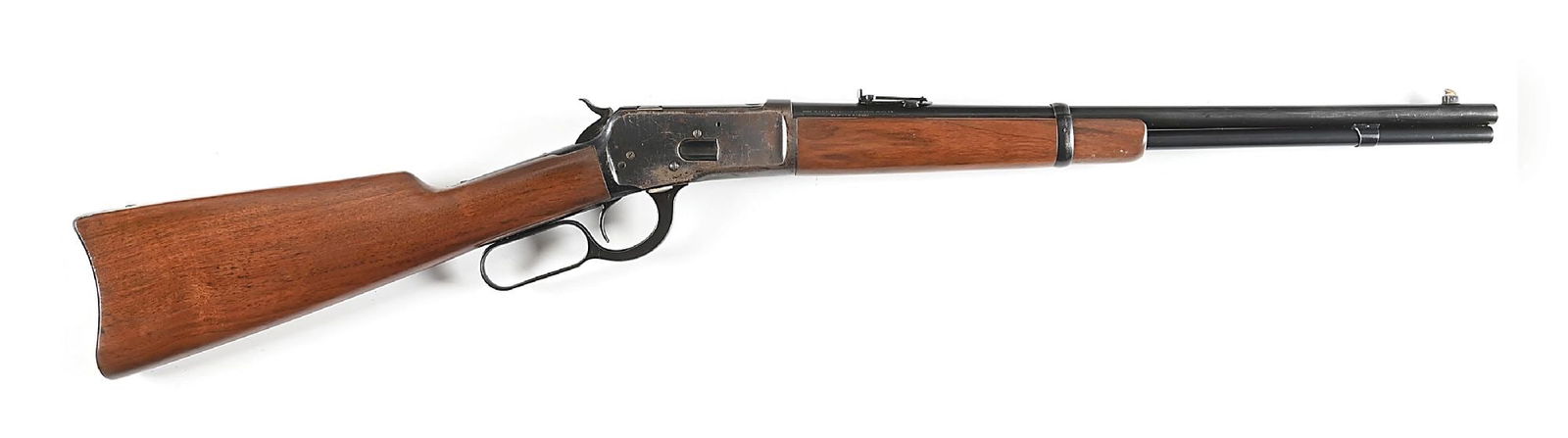 (C) WINCHESTER MODEL 92 SADDLE RING CARBINE IN .32 WCF.: Circa 1927. The blued carbine barrel is fitted with a pinned German silver blade front sight and ladder rear. Blued solid frame with saddle ring. Classic carbine forend and straight grip walnut stock
