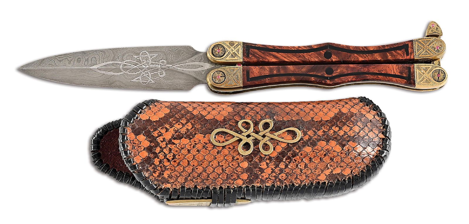 BRIAN CHOVANCE STATELY BUTTERFLY KNIFE.: Seldom does one encounter a butterfly knife of this complexity. Many hours went into the carving, inlay, engraving, leather tanning, sewing, and Damascus work. The spring-loaded self-locking latch is