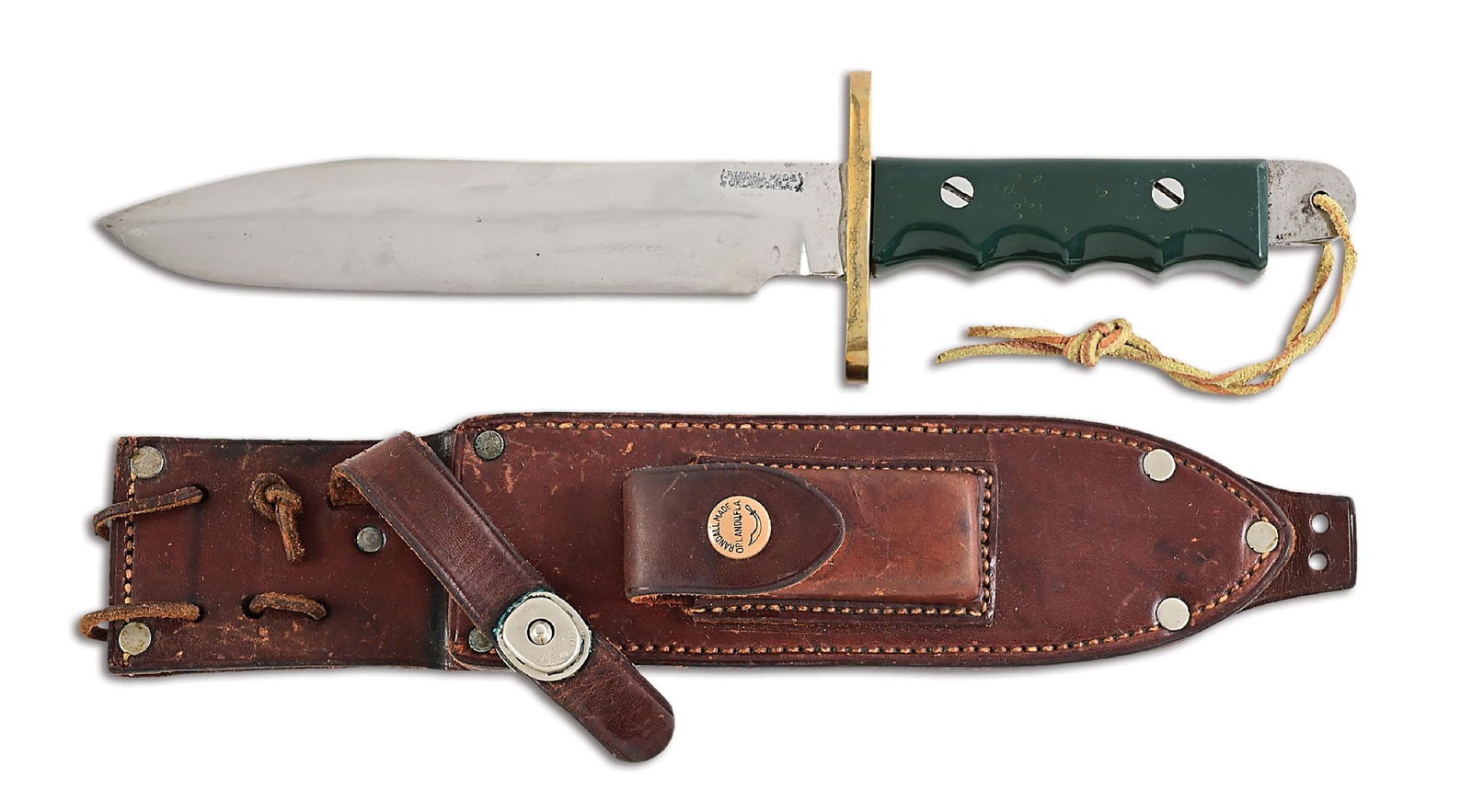 VIETNAM WAR ERA RANDALL MODEL 14 ATTACK WITH GREEN TENITE HANDLE.: A nice example of an early extended tang, green tenite handled Randall Model 14 attack. The knife has the characteristics of a Model 14 that was crafted during the late 1950s. The carbon steel blade f