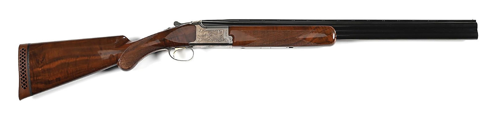 (M) BROWNING CITORI OVER/UNDER 12 GAUGE SHOTGUN.: Manufactured in 1991 per serial number. Features include steel bead on matted vented rib, checkered stock and forearm, gold plated trigger, non-automatic safety/barrel selector switch, and red Brownin