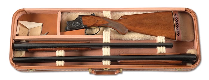 (C) CASED BELGIAN BROWNING SUPERPOSED OVER UNDER SHOTGUN 2 BARREL SET.