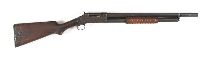(C) POLICE MARKED WINCHESTER MODEL 97 SLIDE ACTION RIOT SHOTGUN.
