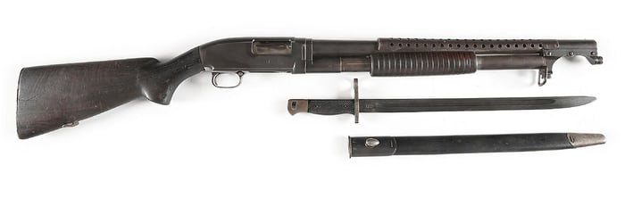 (C) US WINCHESTER MODEL 12 SLIDE ACTION TRENCH SHOTGUN WITH BAYONET.