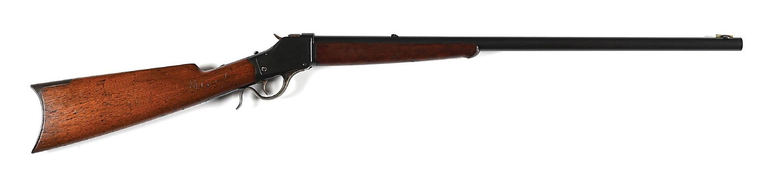 (A) WINCHESTER MODEL 1885 HIGH WALL SINGLE SHOT RIFLE IN .38-56 WCF.: Manufactured in 1889. Blued round barrel with blade front sight and folding express rear. Blue finished high wall receiver with with case colored lever and breech block. Varnished walnut stocks with c