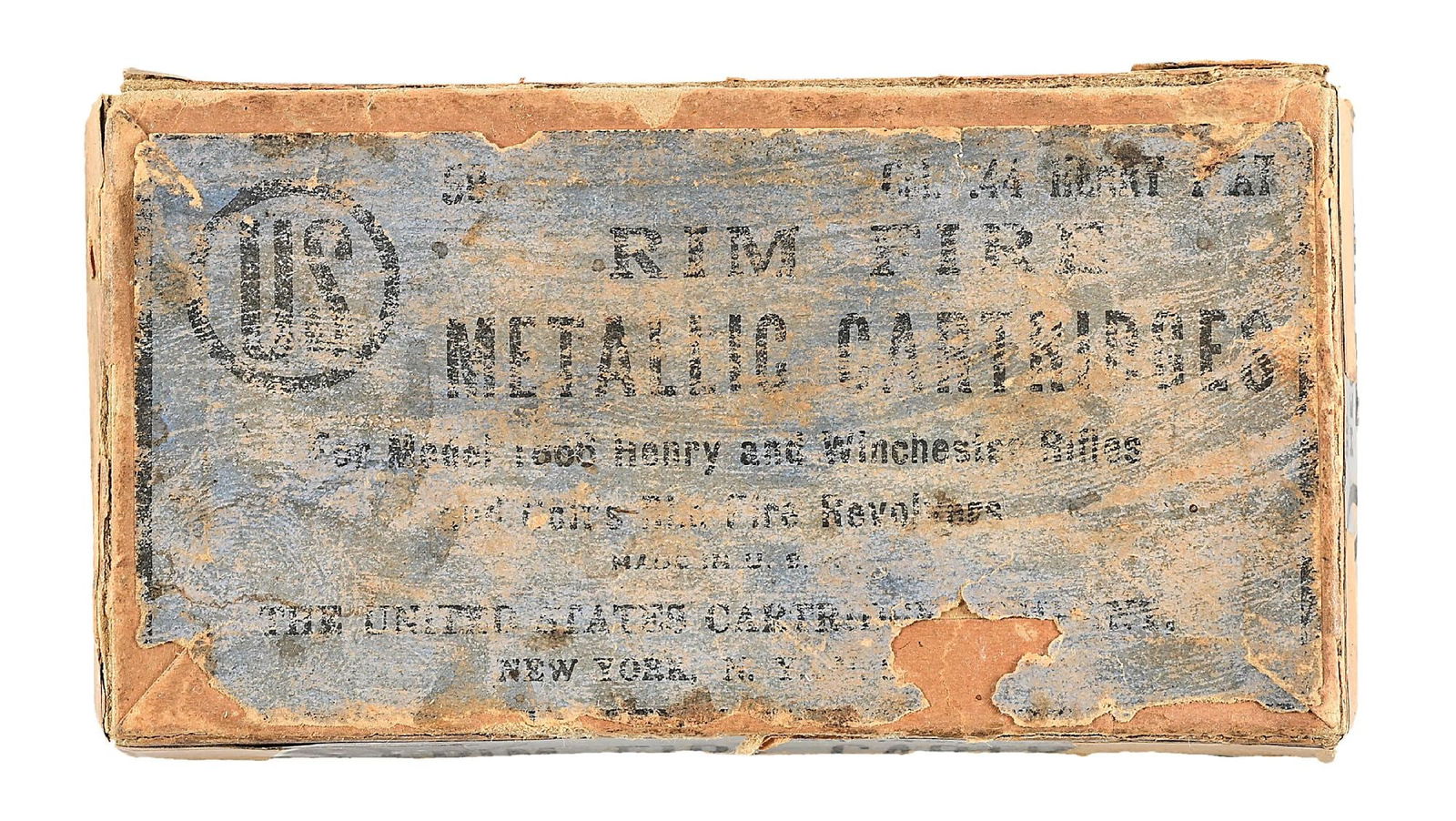 EARLY PARTIAL BOX OF .44 HENRY FLAT FROM THE UNITED STATES CARTRIDGE COMPANY: This early box contains 27 matching rounds of Henry flat rimfire cartridges all with matching US head stamps. The blue label states "For Model 1866 Henry and Winchester rifles and Colt's Rim Fire Revo