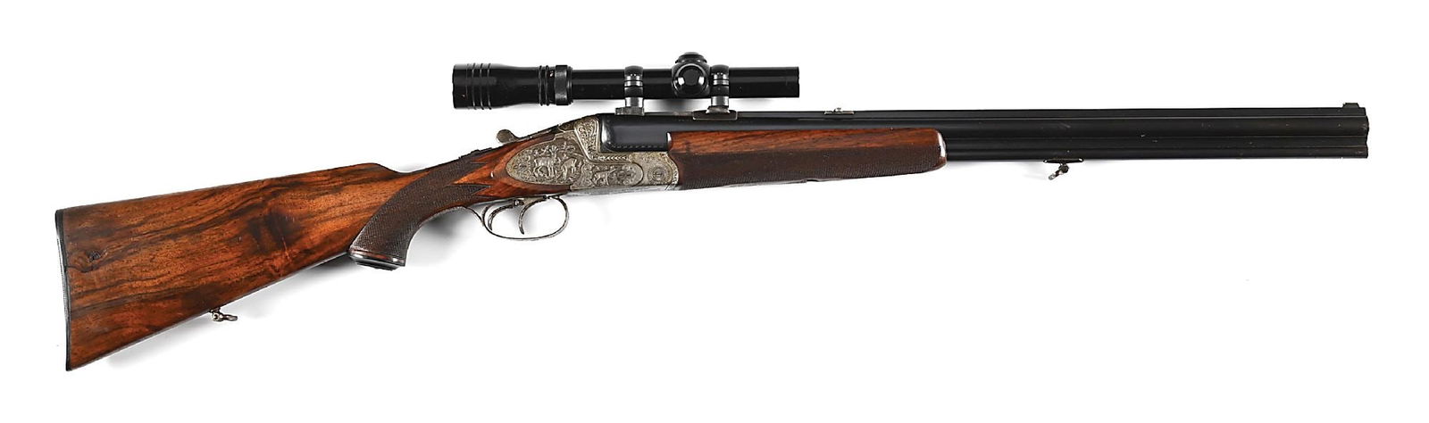 (C) PRE-WAR RICH MAHROLDT & ZOHN OVER UNDER COMBINATION GUN IN 16 GA AND .257 ROBERTS.: This beautiful rifle features German style deep relief game engravings on both sides of frame and base with typical oak leaf borders. Satin nickel finish. The barrels features a solid, matted rib with