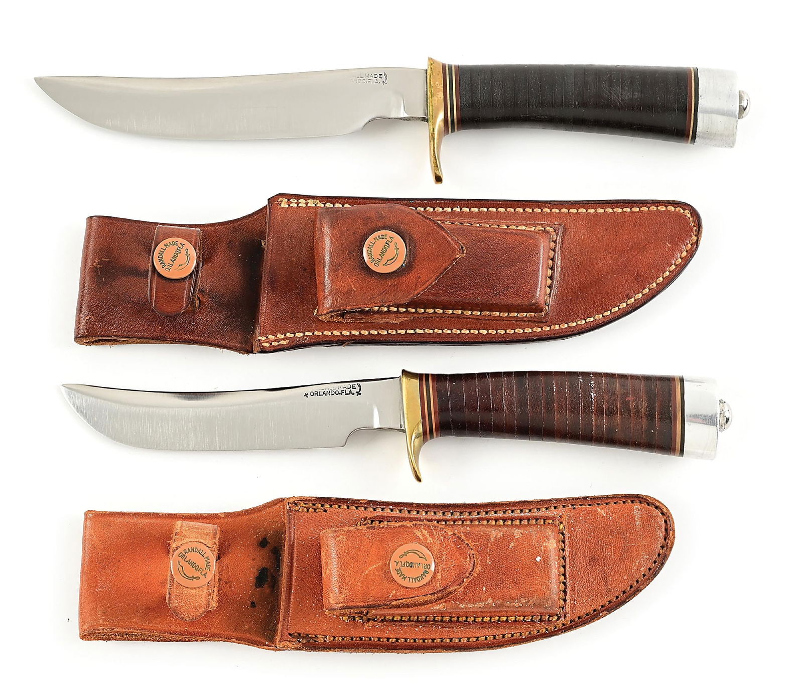 LOT OF 2: RANDALL MODEL 3 HUNTER AND MODEL 4 BIG GAME SKINNER.: Lot consists of: (A) Like the Model 1, the Model 3 Hunter's were also used by World War II servicemen both during and after the war. This circa 1940s Randall Model 3 features a carbon steel blade and