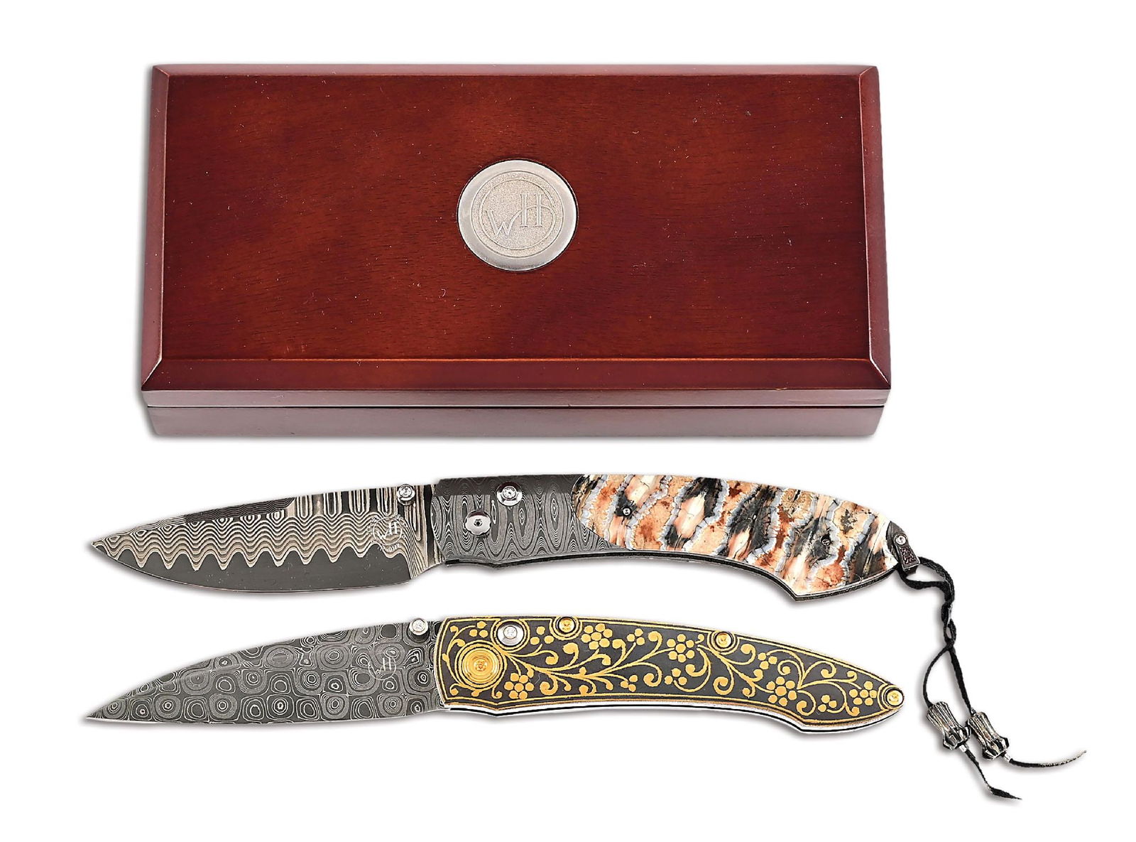 LOT OF 2: WILLIAM HENRY B12 CATALINA AND GOLD VINE FOLDER FOLDING KNIVES.: Lot consists of: (A) William Henry B12 DMD Catalina button lock folding knife that features a "wave" Damascus ZDP-189 core blade with a white topaz thumbstud and button. The blade measures 3" with WH