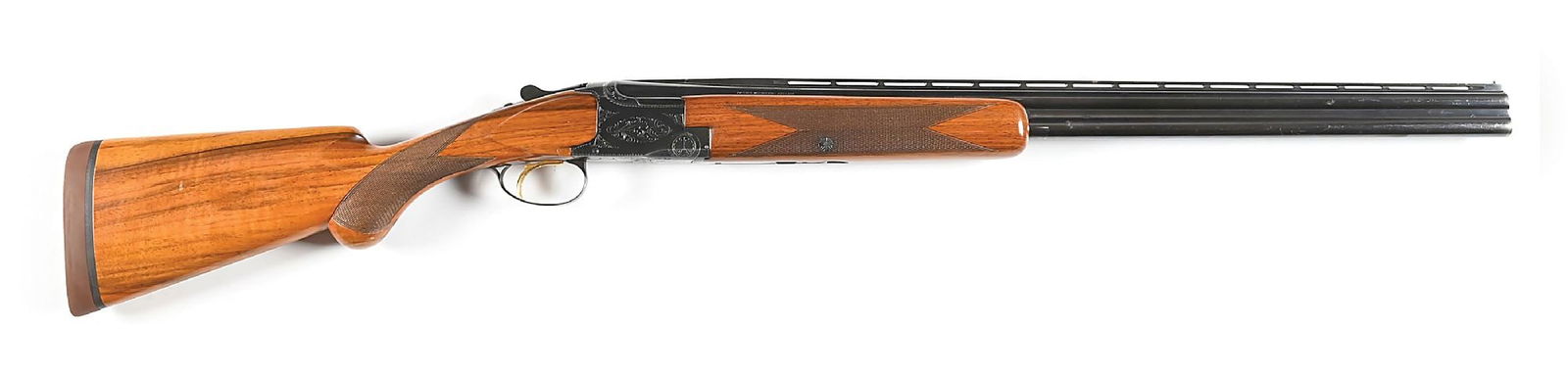 (C) BELGIAN BROWNING LIGHTNING OVER/UNDER 20 GAUGE SHOTGUN.: Manufactured 1967 with single selective trigger, ejectors, highly figured varnished walnut stocks with round knob pistol grip and Pachmayr recoil pad. CONDITION: Very good with 90% barrel finish with