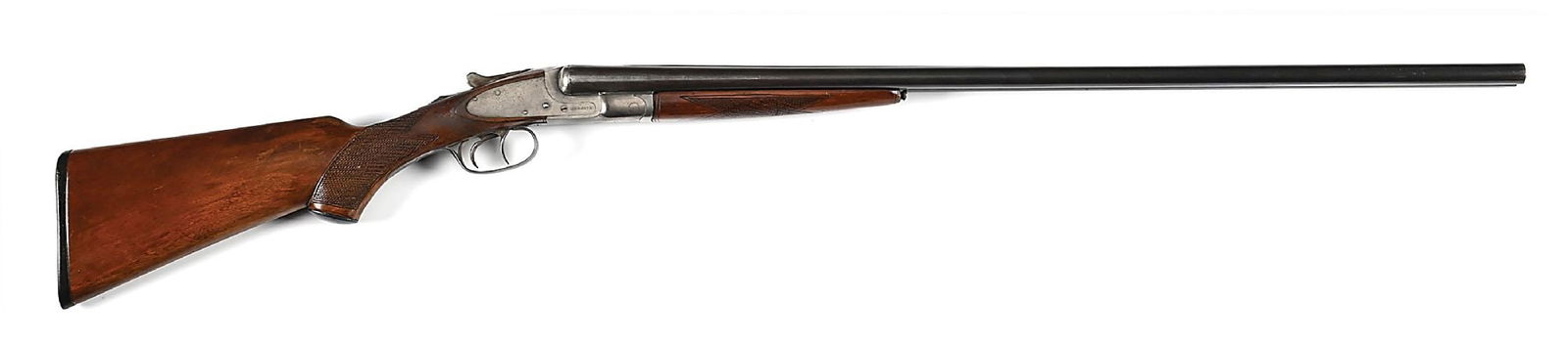 (C) LC SMITH FIELD GRADE (00) 20 BORE SIDE BY SIDE SHOTGUN.: This early gun dates to 1911. It is a 00 grade which simply means a field grade prior to 1918. All matching numbers. Features the blued barrels punctuated by the full matted rib, single bead front sig