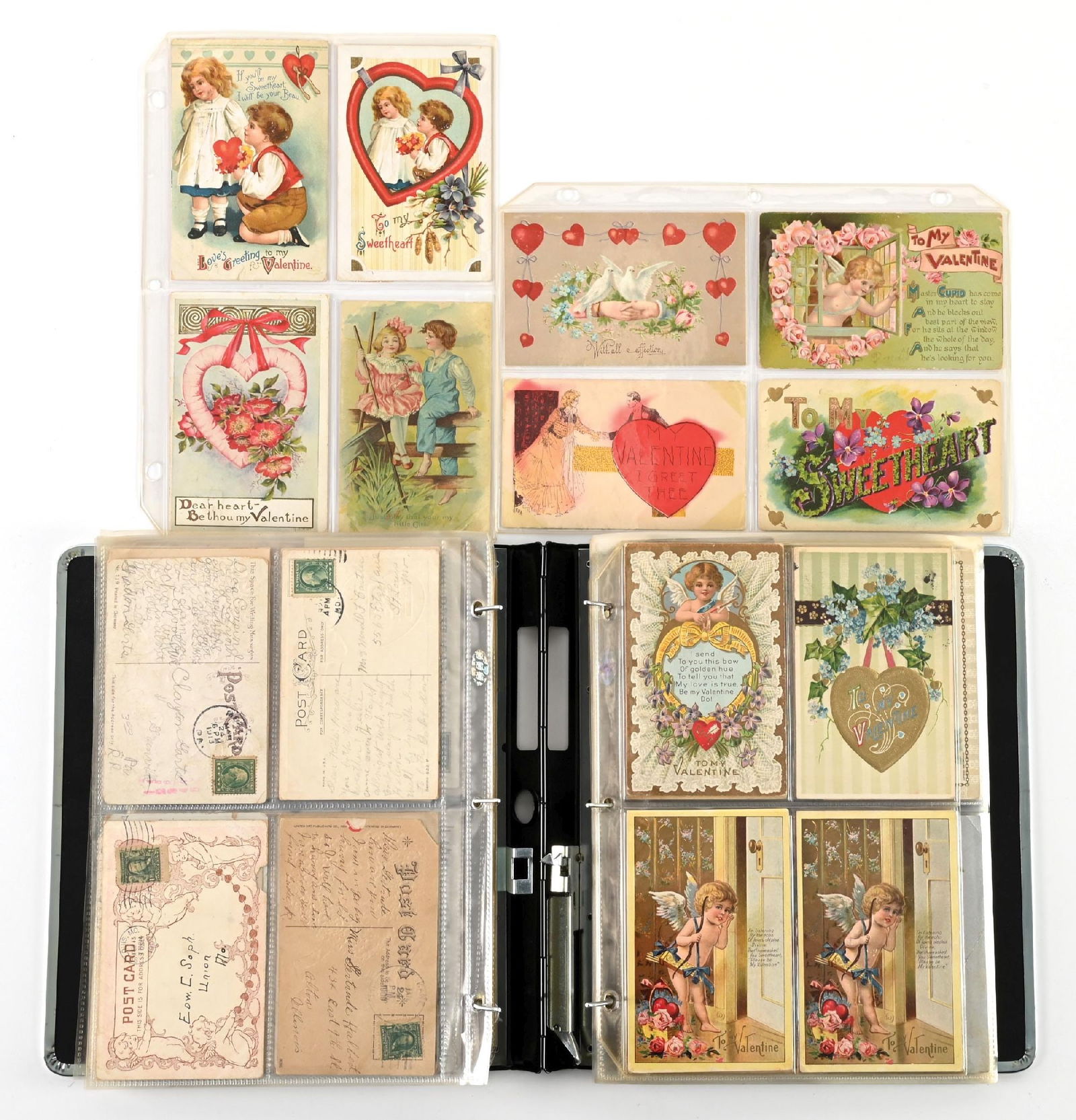 LARGE LOT OF: VARIOUS VINTAGE VALENTINE POSTCARDS: LARGE LOT OF: VARIOUS VINTAGE VALENTINE POSTCARDS Condition: (Excellent) Dimensions: Album: 10 - 3/8" x 2 - 1/4" x 11 - 1/2".