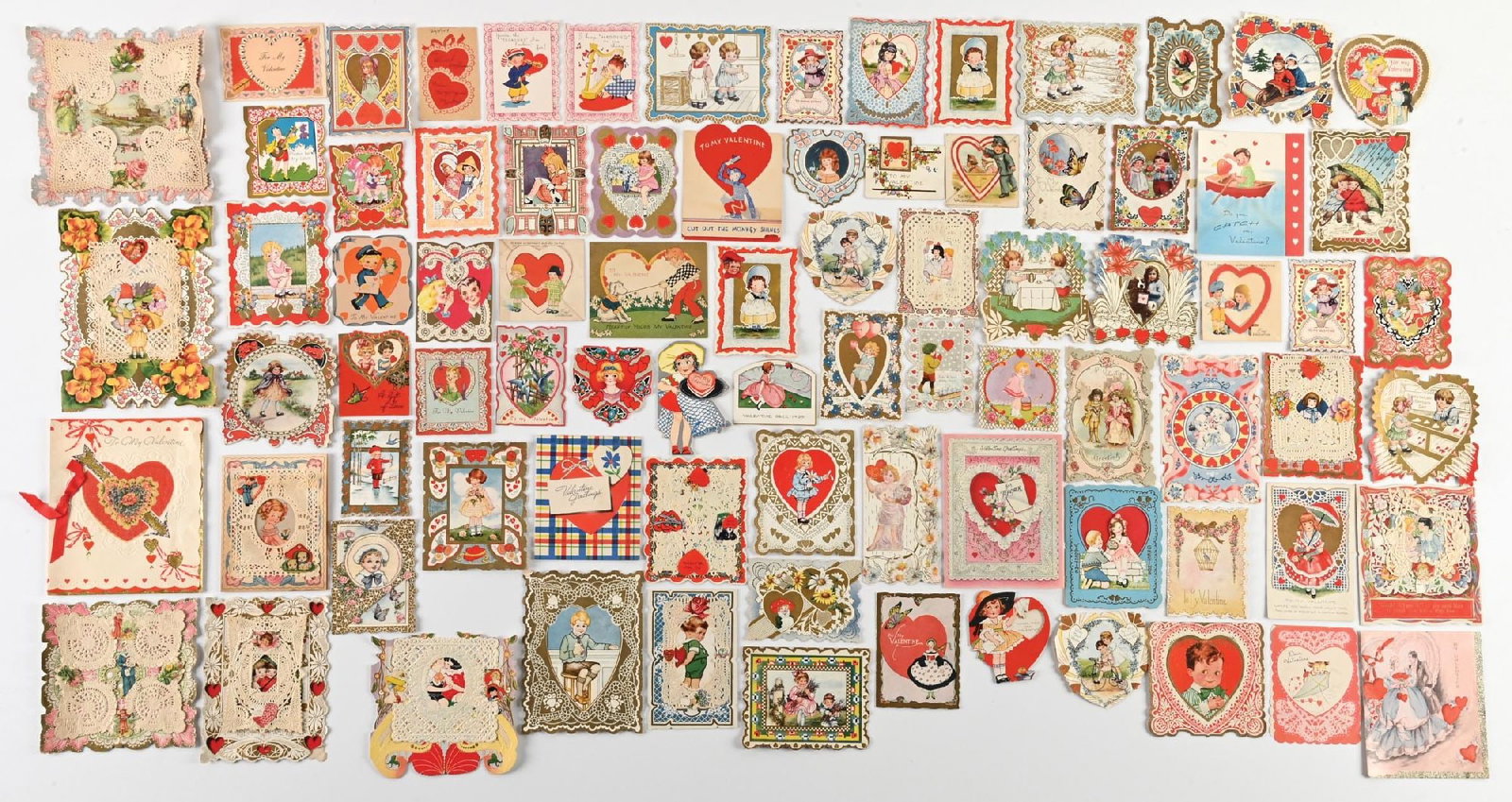 LARGE LOT OF: VARIOUS VINTAGE DIE CUT LACE VALENTINE GREETING CARDS: LARGE LOT OF: VARIOUS VINTAGE DIE CUT LACE VALENTINE GREETING CARDS Condition: (Excellent) Dimensions: Largest: 8" x 5 - 3/4".