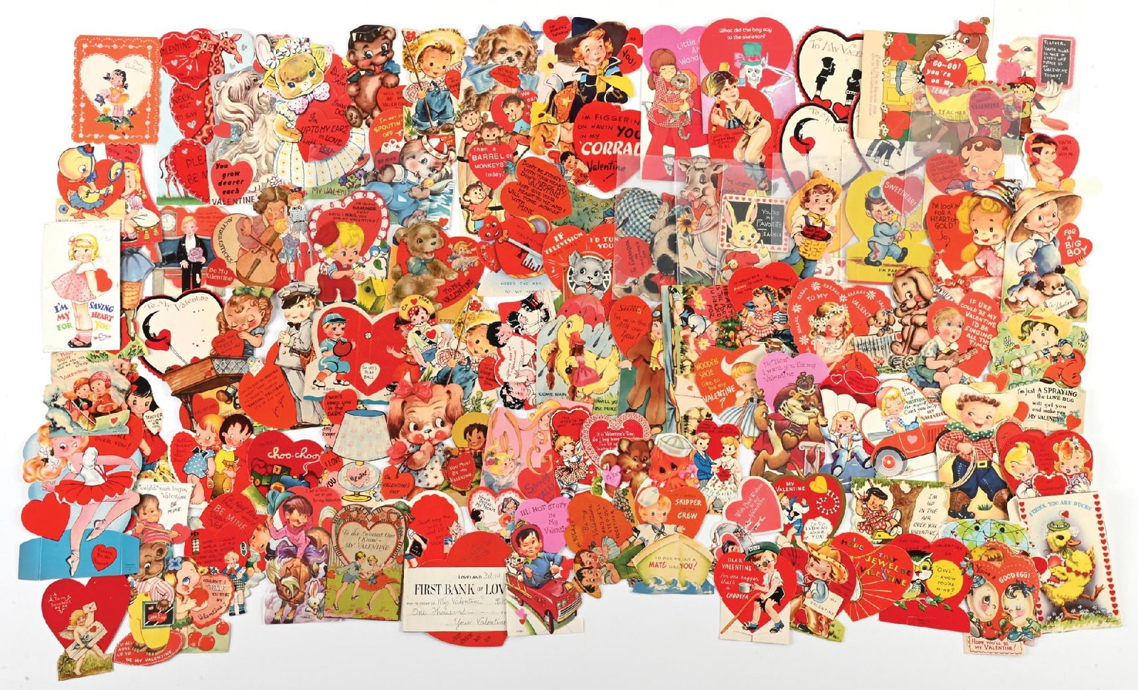 LARGE LOT OF: VARIOUS VINTAGE DIE CUT VALENTINE HEARTS GREETING CARDS: LARGE LOT OF: VARIOUS VINTAGE DIE CUT VALENTINE HEARTS GREETING CARDS Condition: (Excellent) Dimensions: Largest: 7 - 1/2" x 4".