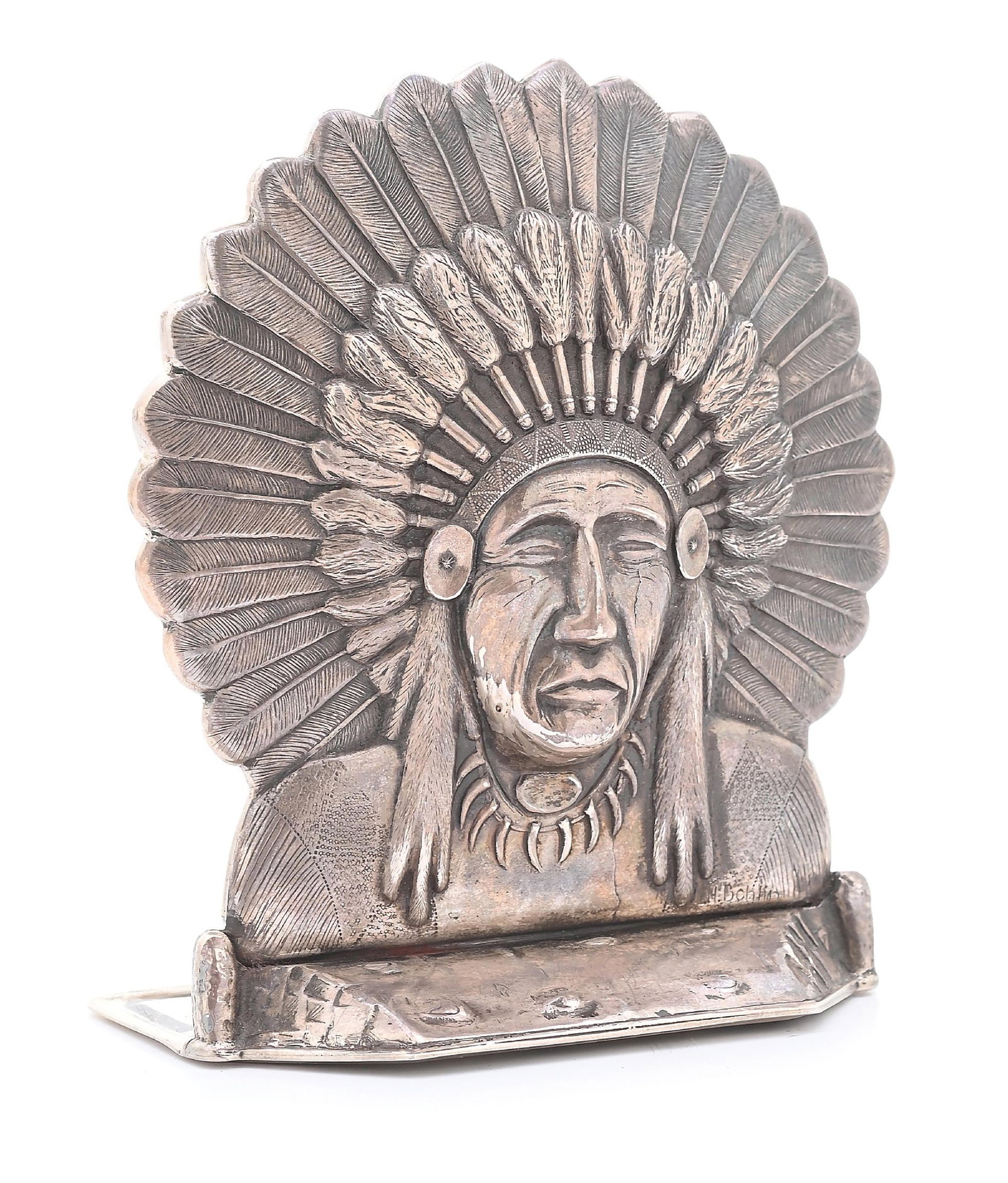 SINGLE STERLING SILVER BOHLIN BOOKEND: Circa 1980s. Featuring Bohlin’s iconic three-dimensional Native American head with Chief’s headdress, this bookend measures 6" tall by 1" deep, with foot extending 2", with a total weight 