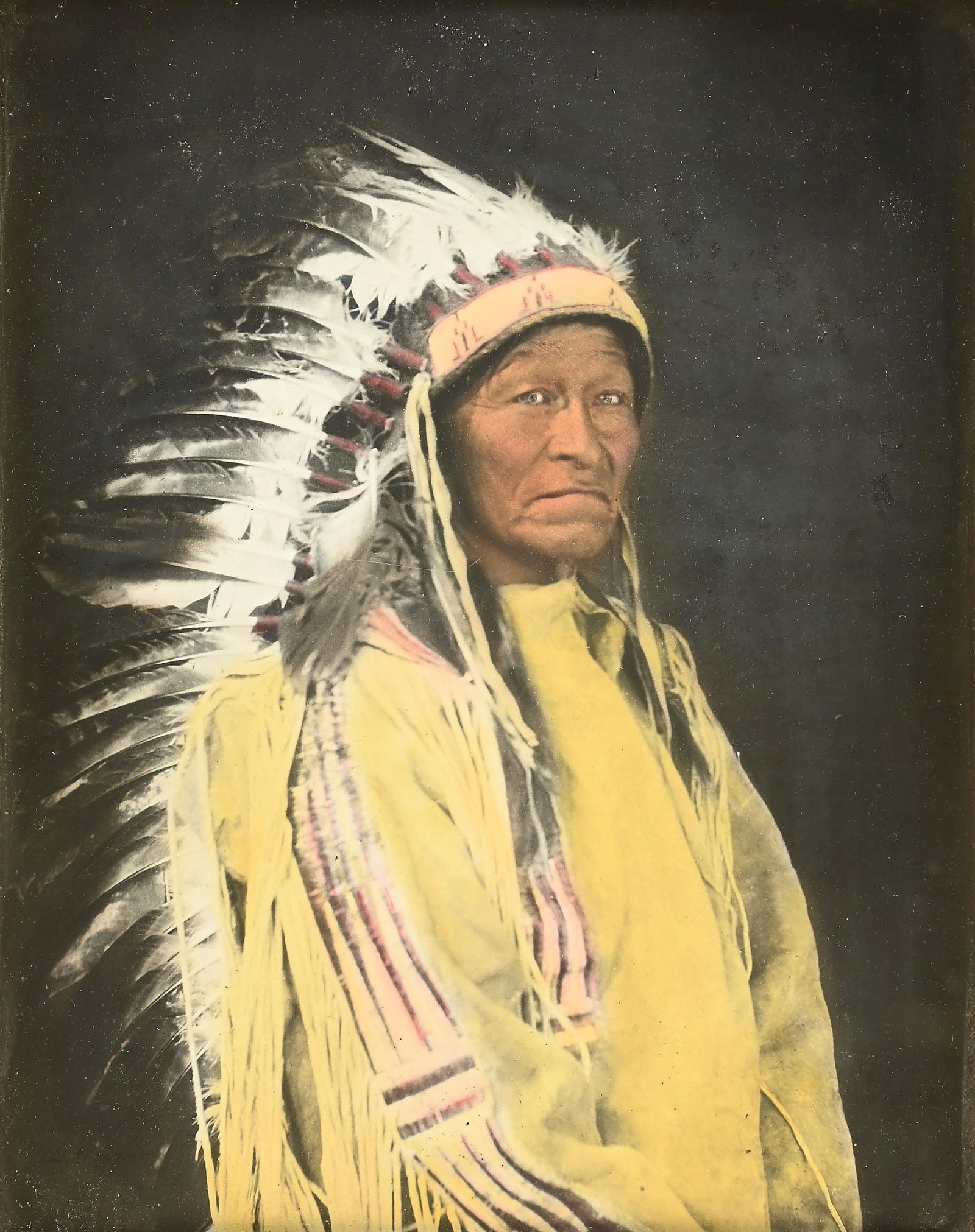 CARL MOON (AMERICAN, 1878-1948): Standing Elk - War Captain of Taos., c. 1914 large format color hand tinted photograph signed "Carl Moon" lower right corner sight: 20" x 16" framed: 27" x 23" in original ornate gold tone wood frame