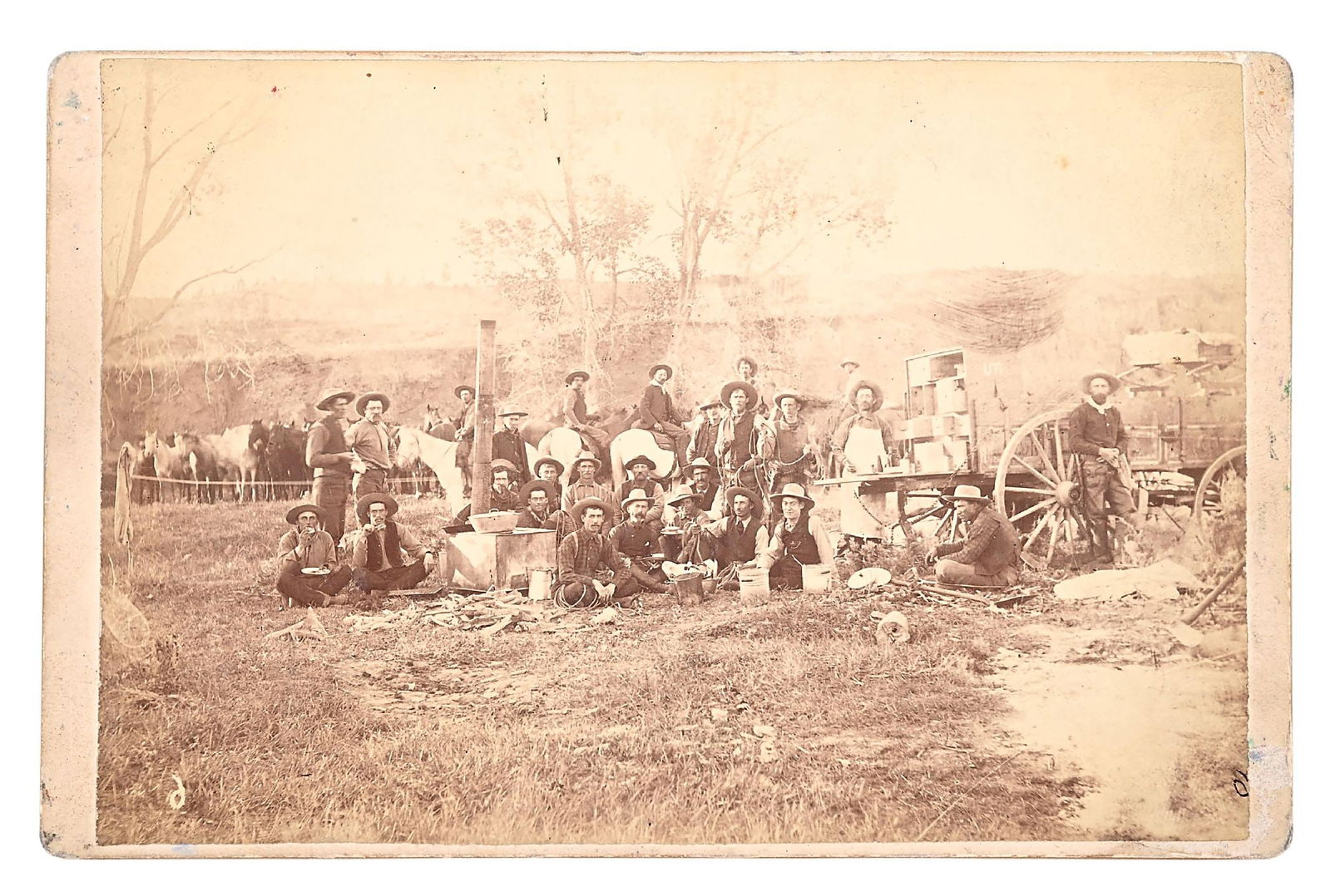 O.S. GOFF CABINET PHOTO OF COWBOYS AND CHUCK WAGON. (1 of 2)