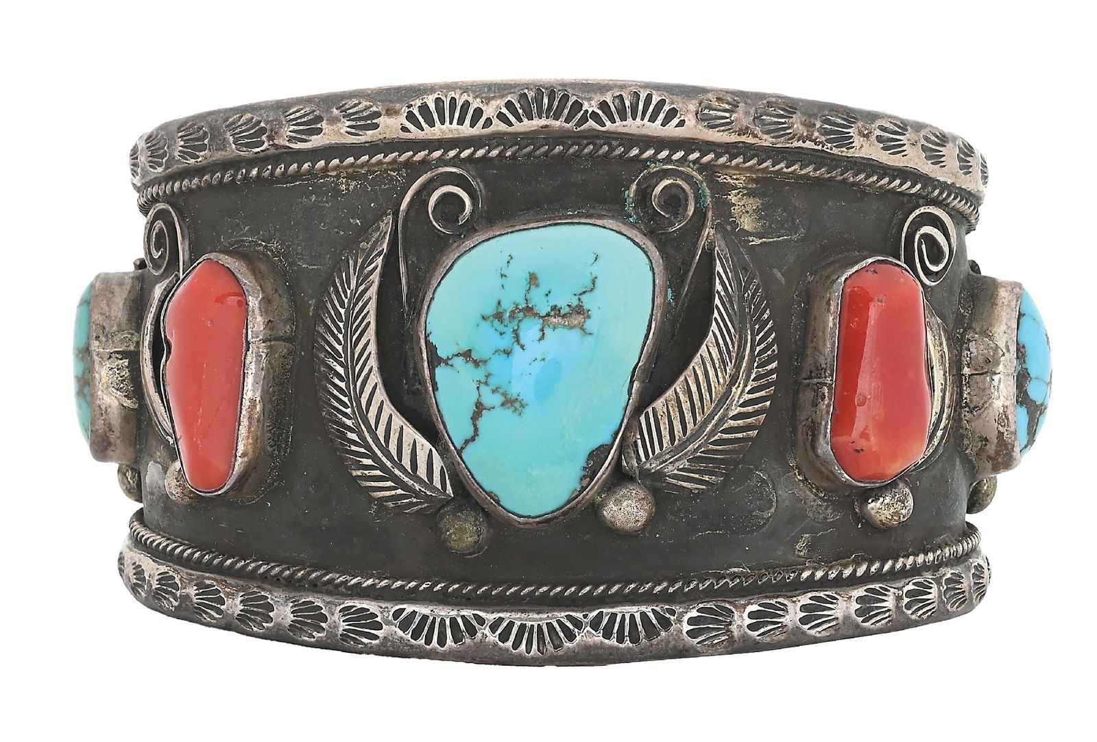 MEN'S STERLING SILVER CORAL & TURQUOISE NATIVE AMERICAN CUFF BRACELET: Contemporary. Men's sterling silver red coral and turquoise cuff bracelet. Signed with unknown mark. Inside diameter measures 2-3/4". Widest point measures 2". Gross weight is 145.4 grams. Condition: