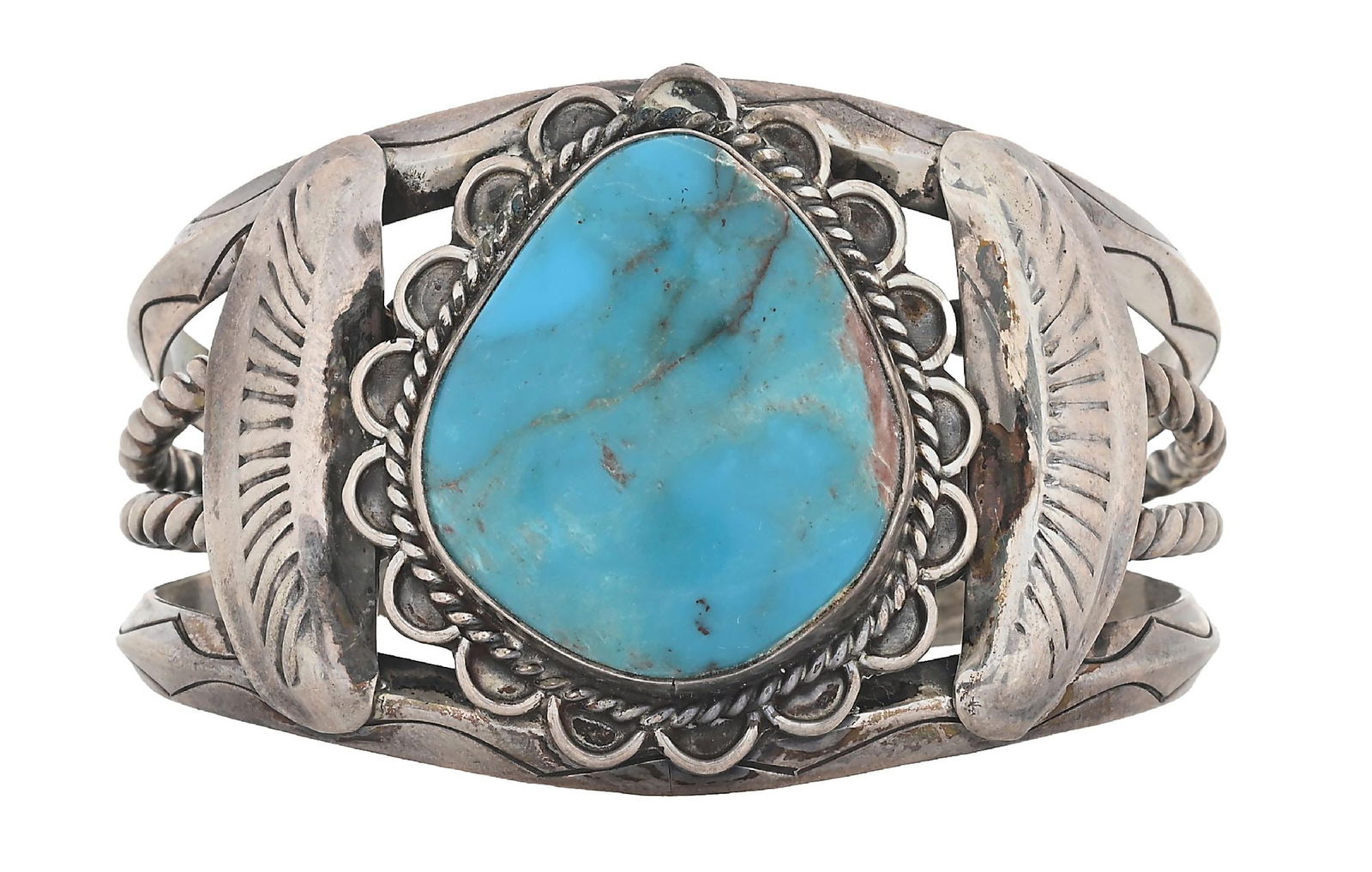 STERLING SILVER & TURQUOISE NATIVE AMERICAN CUFF BRACELET: Contemporary. Sterling silver and turquoise cuff bracelet. Signed with unknown mark. Inside diameter measures 2-1/4". Widest point measures 1-5/8". Gross weight is 57.6 grams. Condition: Very good - e