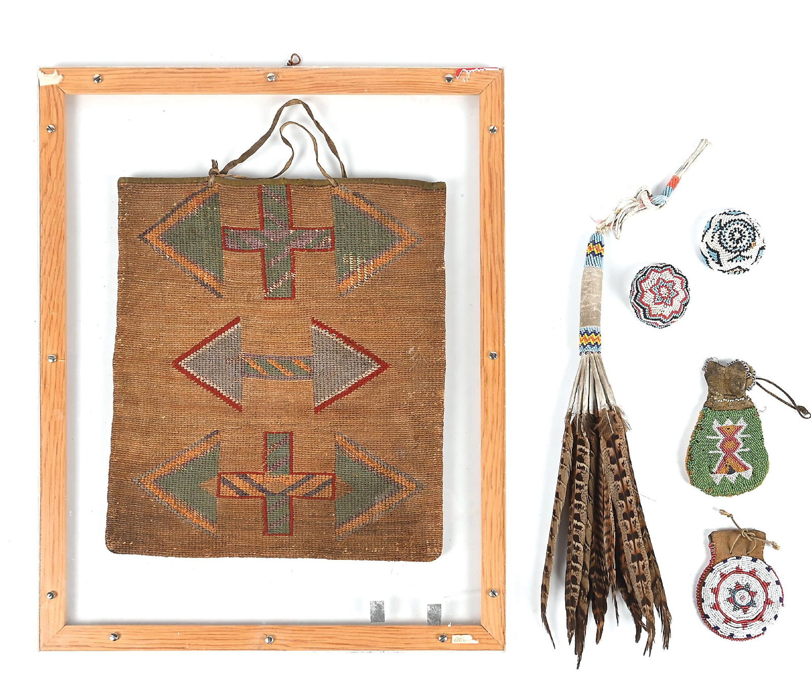 LOT OF 6: MIXED NATIVE AMERICAN OBJECTS: (A) Nez Perce Corn Husk Bag in acrylic glass frame. One side with arrow motifs, the other side with geometric pattern. (B) Kiowa Feathered Fan. (C) Two Paiute Beaded Baskets. (D) Circular Lakota Pouch