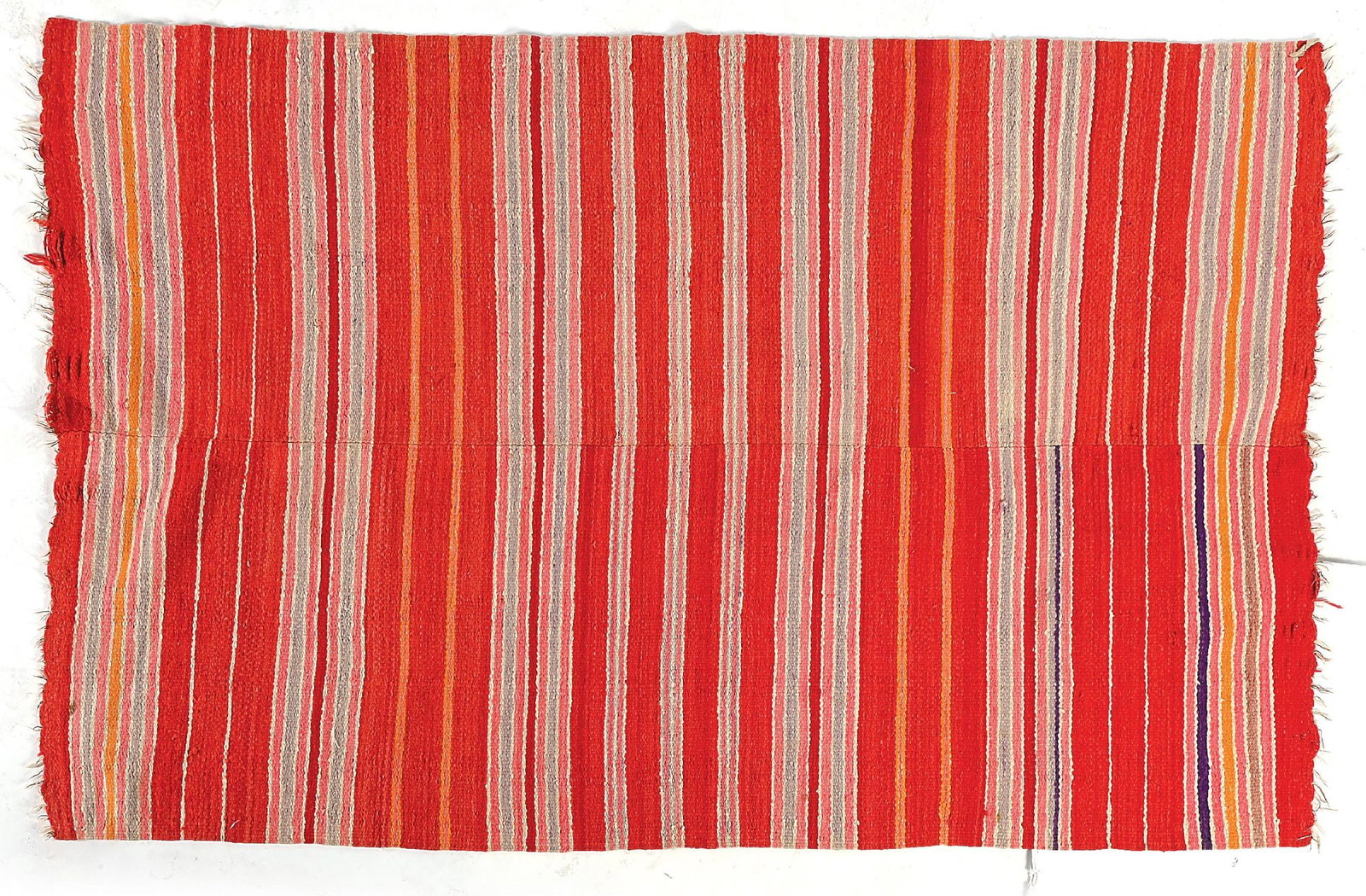 RIO GRANDE TEXTILE: Turn of the 19th century. With an overall banded pattern. Condition: Top and bottom edge damage. Some holes. Colors: Red, Grey, Pink, White, Orange, Purple Dimensions: 79" x 50".