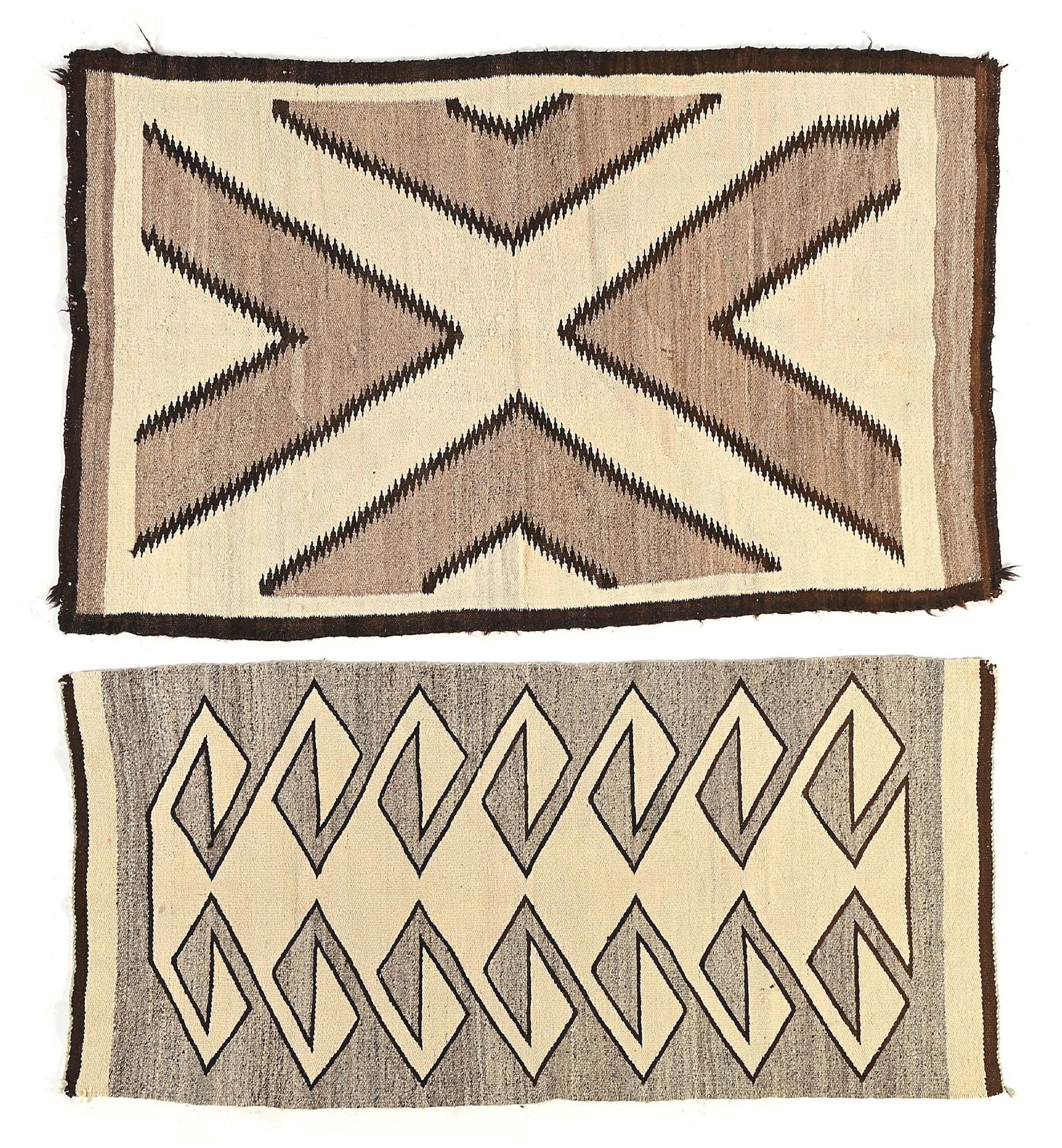 LOT OF 2: NAVAJO (DINÉ) RUGS: (A) First quarter 20th century. With serrated triangle designs forming a large central "X". Dimensions: 60" x 36-1/2" Condition: Staining, side selvedge and end damage. Natural Colors: White, Brown, D