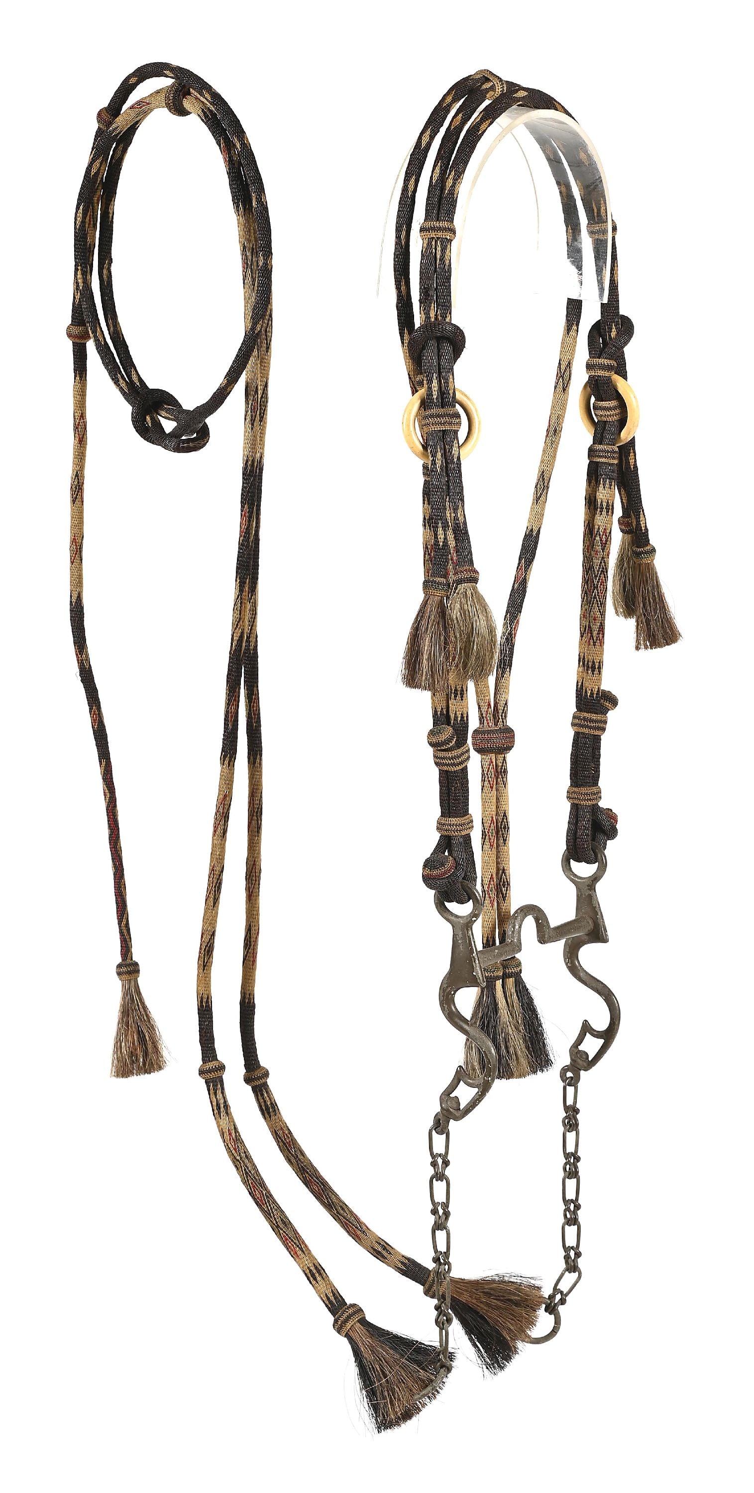 WYOMING HORSEHAIR BRIDLE: Outstanding Wyoming bridle with original correct prison used iron bit. Finely executed with red, natural, black and turquoise green hitched horsehair displayed in great geometric patterns with ce