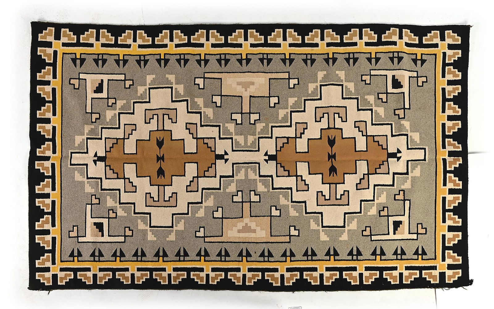 NAVAJO (DINÉ) LARGE RUG: Contemporary. With a central double-stepped diamond encased by a wide border of geometric stepped pattern, with a mixture of commercial and homespun yarn. Condition: Some staining and damage to side s