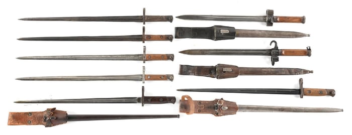 LOT OF 8: HUNGARIAN AND BELGIAN BAYONETS.