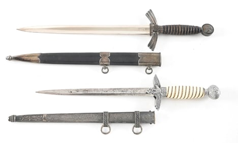 LOT OF 2: GERMAN WWII LUFTWAFFE FIRST AND SECOND MODEL DAGGERS.