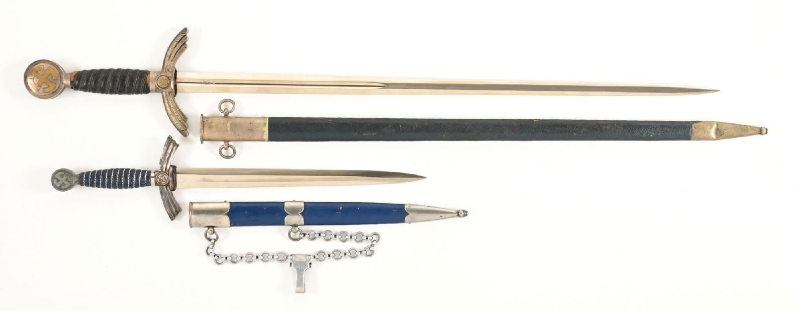 LOT OF 2: GERMAN WWII LUFTWAFFE SWORD AND FIRST MODEL DAGGER.: Lot consists of: (A) Luftwaffe officer's sword with a "SMF / Solingen" marked blade with bright blade and scattered blemishes. Blue leather washer is mostly gone. Fittings have moderate wear with pati