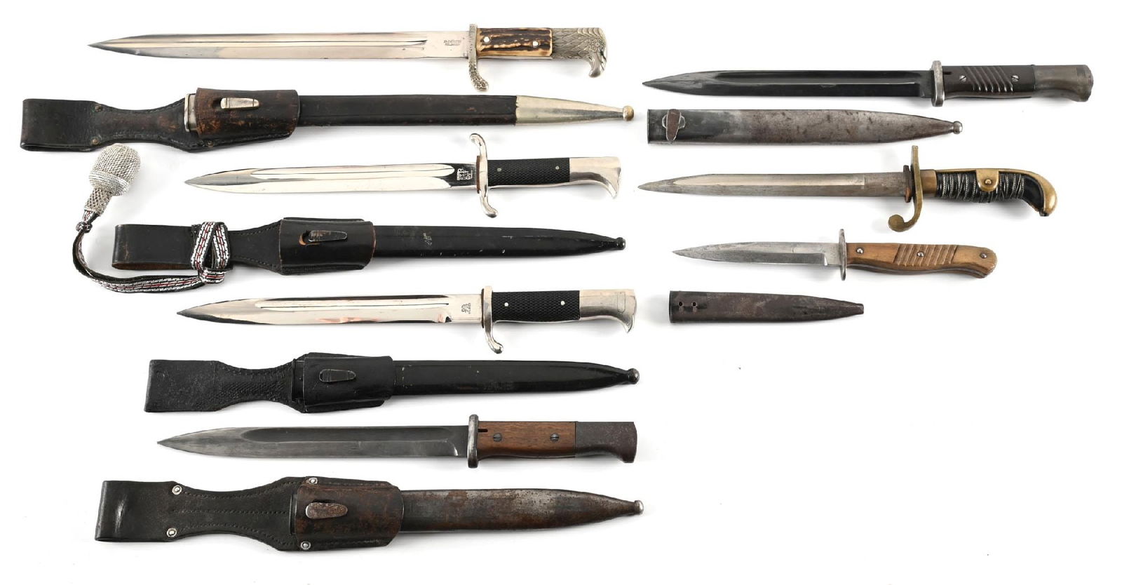 LOT OF 7: THIRD REICH AND IMPERIAL GERMAN BAYONETS AND KNIVES.: Lot consists of: (A) Third Reich police bayonet with an "E&F HORSTER / SOLINGEN" marked nickel-plated steel blade that exhibits scattered light marks throughout its length. Nickel-plated brass fitting