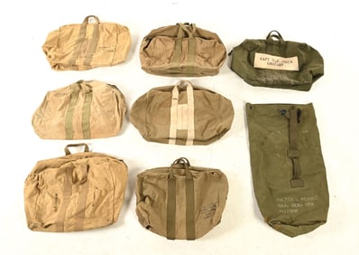 LOT OF 8: US WWII AVIATOR KIT BAGS AND DUFFLE BAG.