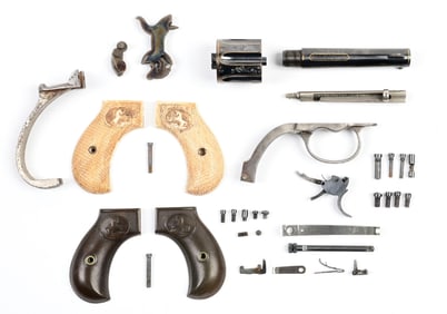 LOT OF COLT 1877 DOUBLE ACTION REVOLVER PARTS./