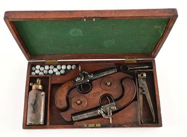 (A) CASED PAIR OF JOHN BLANCH PERCUSSION MUFF PISTOLS.
