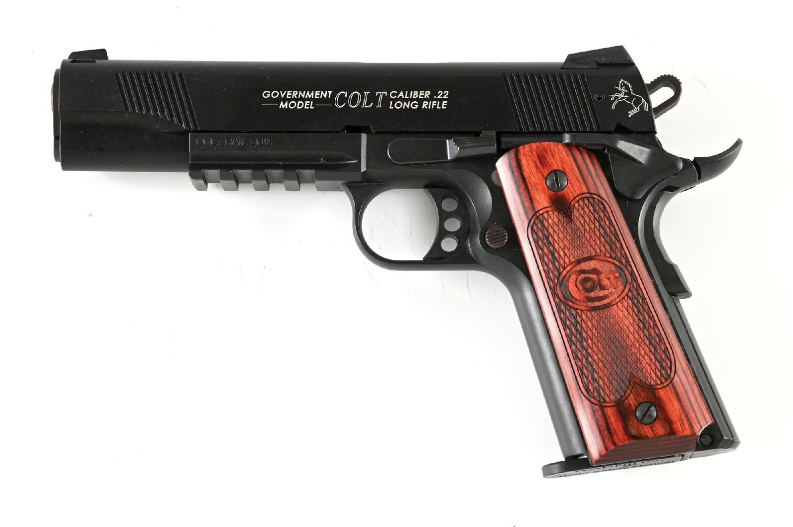 (M) COLT GOVERMENT MODEL 1911 RAIL GUN SEMI-AUTOMATIC PISTOL.: Made in Germany for Colt by Carl Walther. Typical configuration for this model with red grips. Accompanied by factory case. CONDITION: Shows as near new. Mechanically sound. Bright bore. Accessories: 