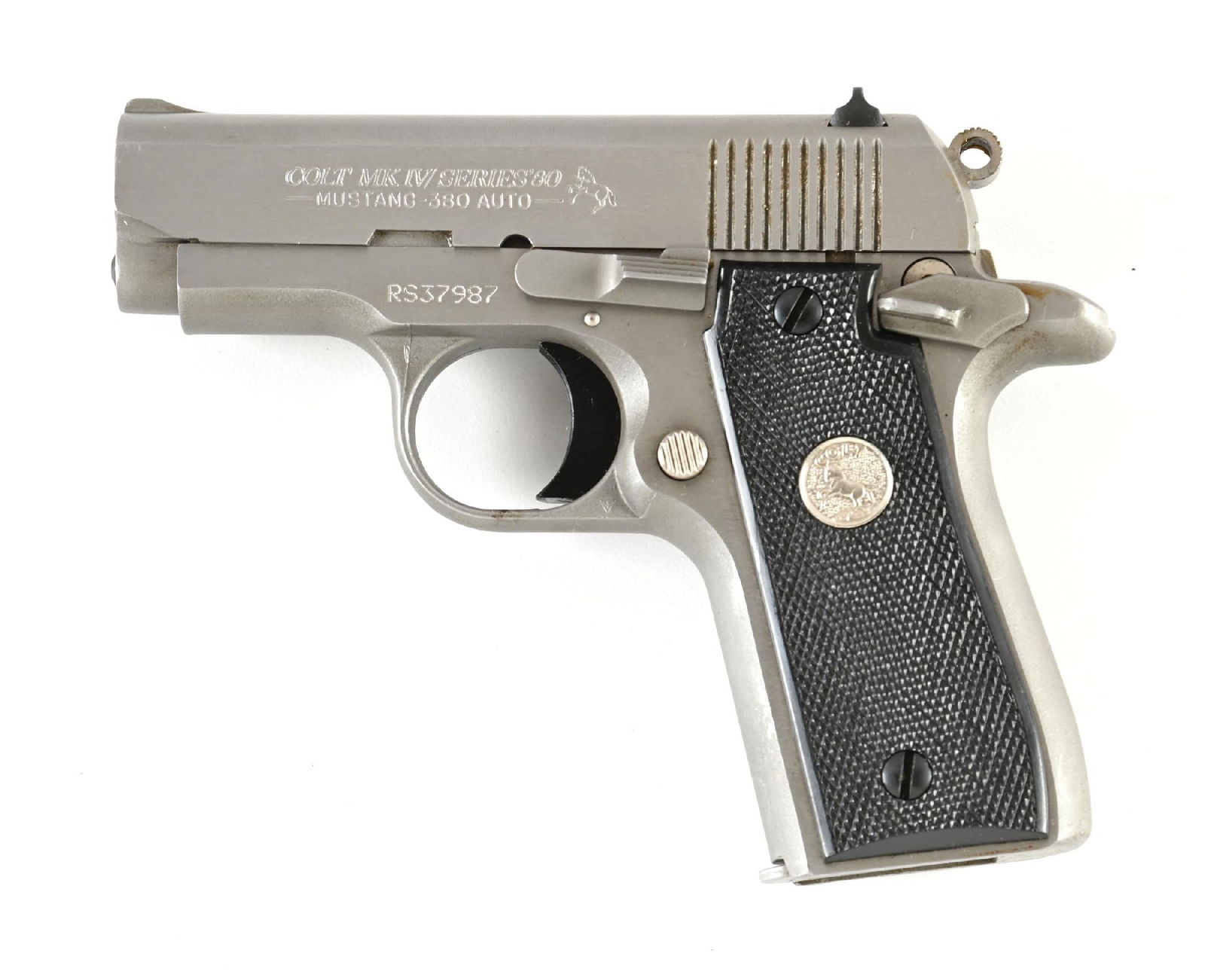 (M) COLT MKIV SERIES 80 MUSTANG PLUS II .380 ACP SEMI-AUTOMATIC PISTOL WITH CASE.: The Plus II was essentially a Mustang with a lengthened grip frame to add the eponymous 2 extra rounds. Other features as standard. Bright stainless finish. With blue plastic Colt case and Colt kraft