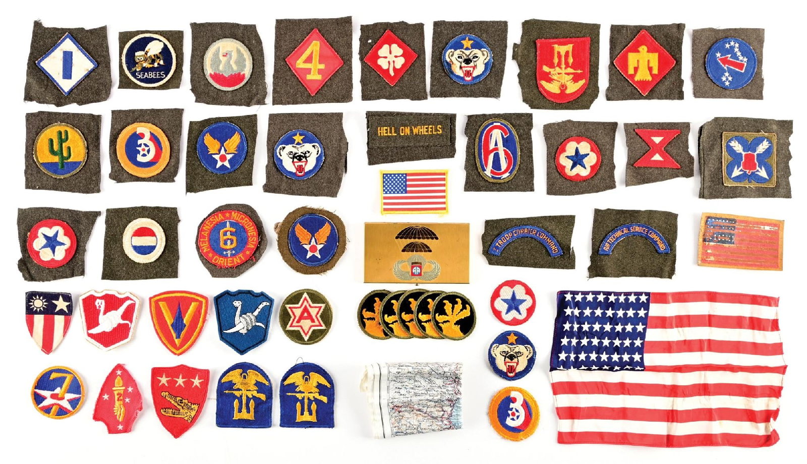 LOT OF US WWII-POST WWII PATCHES AND INSIGNIA.: Lot contains numerous US World War II and post-WWII patches and insignia. CONDITION: Overall excellent.