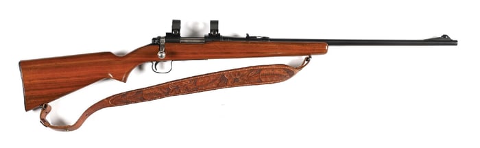 (C) REMINGTON MODEL 722 BOLT ACTION RIFLE.
