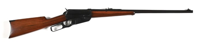 (C) WINCHESTER MODEL 1895 LEVER ACTION RIFLE.
