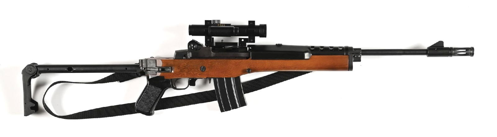 (M) RUGER MINI 14 SEMI-AUTOMATIC RIFLE WITH DESIRABLE FOLDING STOCK.: Manufactured in 1989. Features include flash hider, large ramp front sight, ventilated composite top cover, plain walnut stock, checkered composite pistol grip, and desirable factory folding stock. Mo