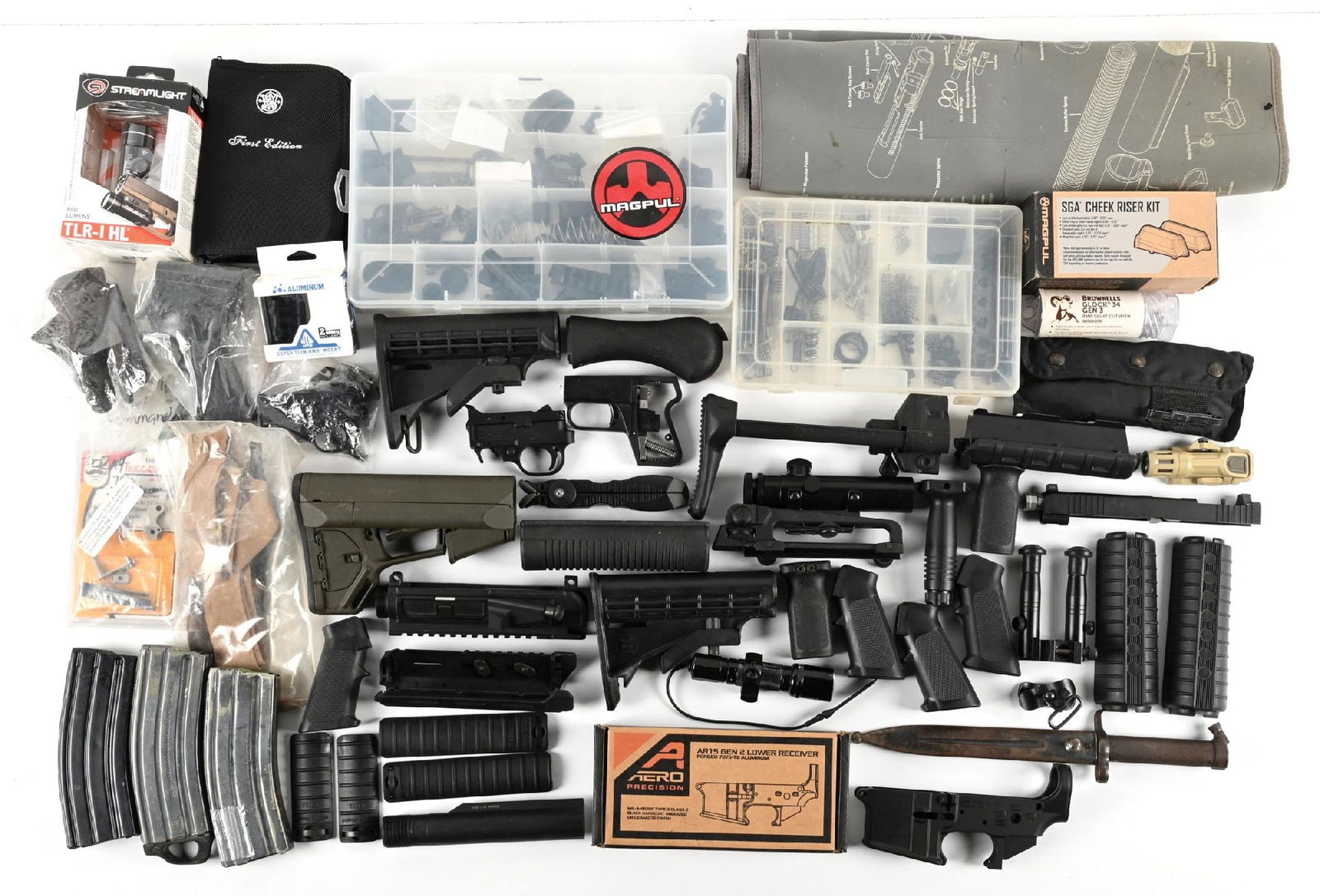 (M) LARGE LOT OF MISC. GUN AND AR15 PARTS WITH A AERO X-15 LOWER RECEIVER: The lot consists mostly of new and used AR-15 builder's parts. Highlights include an Aero X15 AR15 stripped lower, a VLTOR MUR 1A upper receiver, a used HK-style unbranded A3 2-position collapsible st