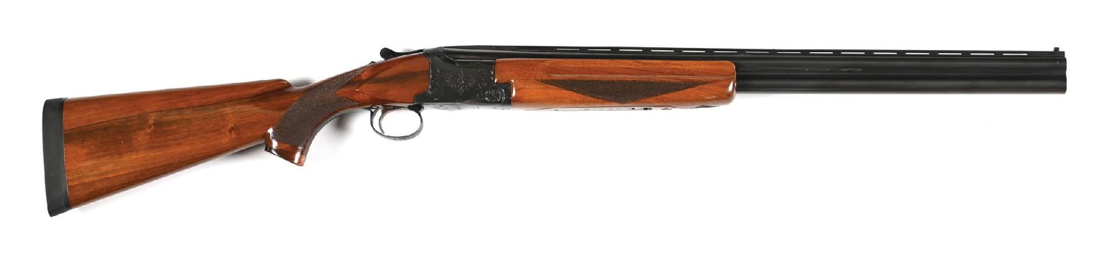 (M) WINCHESTER MODEL 101 OVER/UNDER 12 GAUGE SHOTGUN.: Made by Olin-Kodensha for Winchester. Bradley style aluminum bead front sight with brass mid bead, matted vent rib, typical legends for configuration, round nose forearm with finger grooves, Deely lat