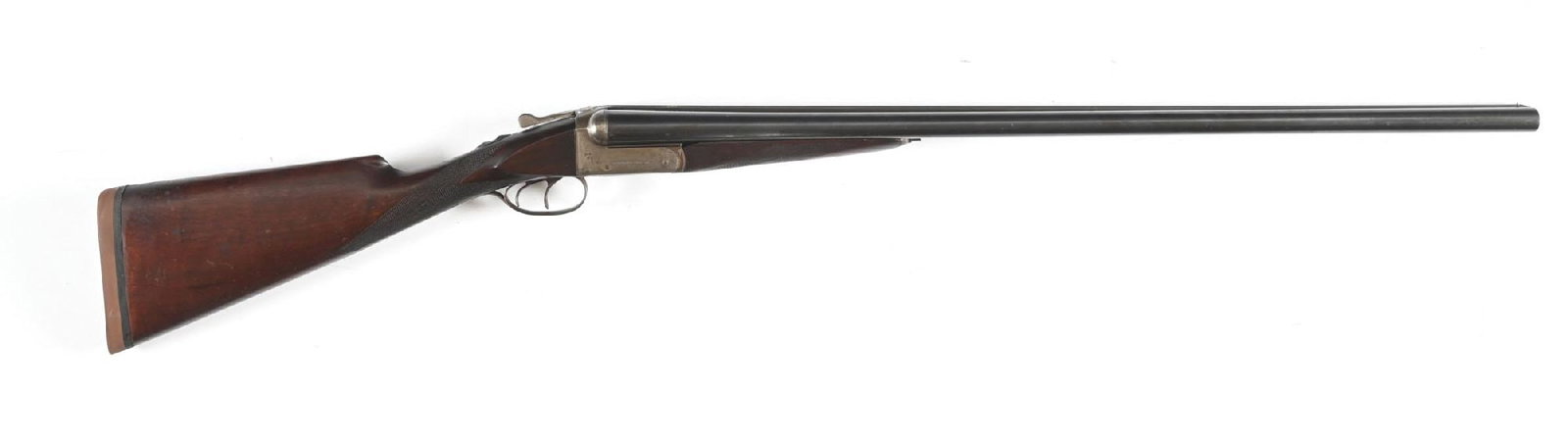 (C) REMINGTON MODEL 1894 FE GRADE SIDE BY SIDE TRAP GUN.: Circa 1906. Dovetail lump barrels with small-sized bead front sight on wide, matted, slightly concave rib. Engraved "Trap Gun. "F." Grade." and "Remington Arms Co. Ilion. N.Y." over chambers. Rib exte