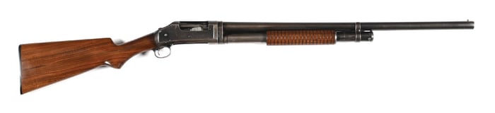 (C) WINCHESTER MODEL 1897 SLIDE ACTION SHOTGUN.