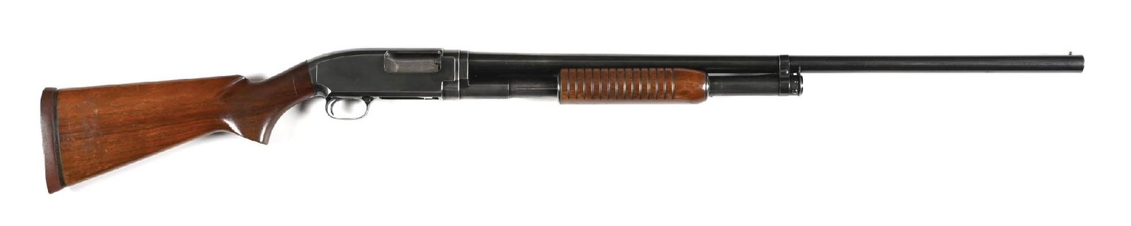 (C) WINCHESTER MODEL 12 HEAVY DUCK TAKEDOWN SLIDE ACTION SHOTGUN.: Manufactured in 1949 in classic configuration, with the exception of 3" chambers and full choke for duck hunting. Buttplate is mounted with aftermarket Winchester marked recoil pad. CONDITION: Good. M