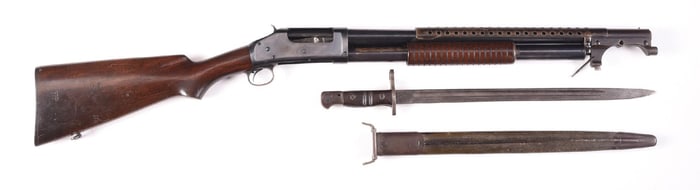 (C) WINCHESTER MODEL 97 SLIDE ACTION TRENCH STYLE SHOTGUN WITH WINCHESTER BAYONET.