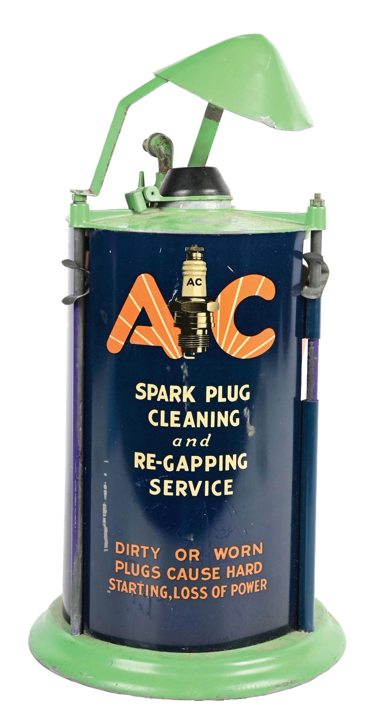 AC SPARK PLUG CLEANING & RE-GAPPING SERVICE STATION DISPLAY.: Single Sided Tin Service Station Display for AC Spark Plugs showing Spark Plug graphic on each side with original catch bag at the backside. CONDITION: Excellent color & gloss throughout showing minor