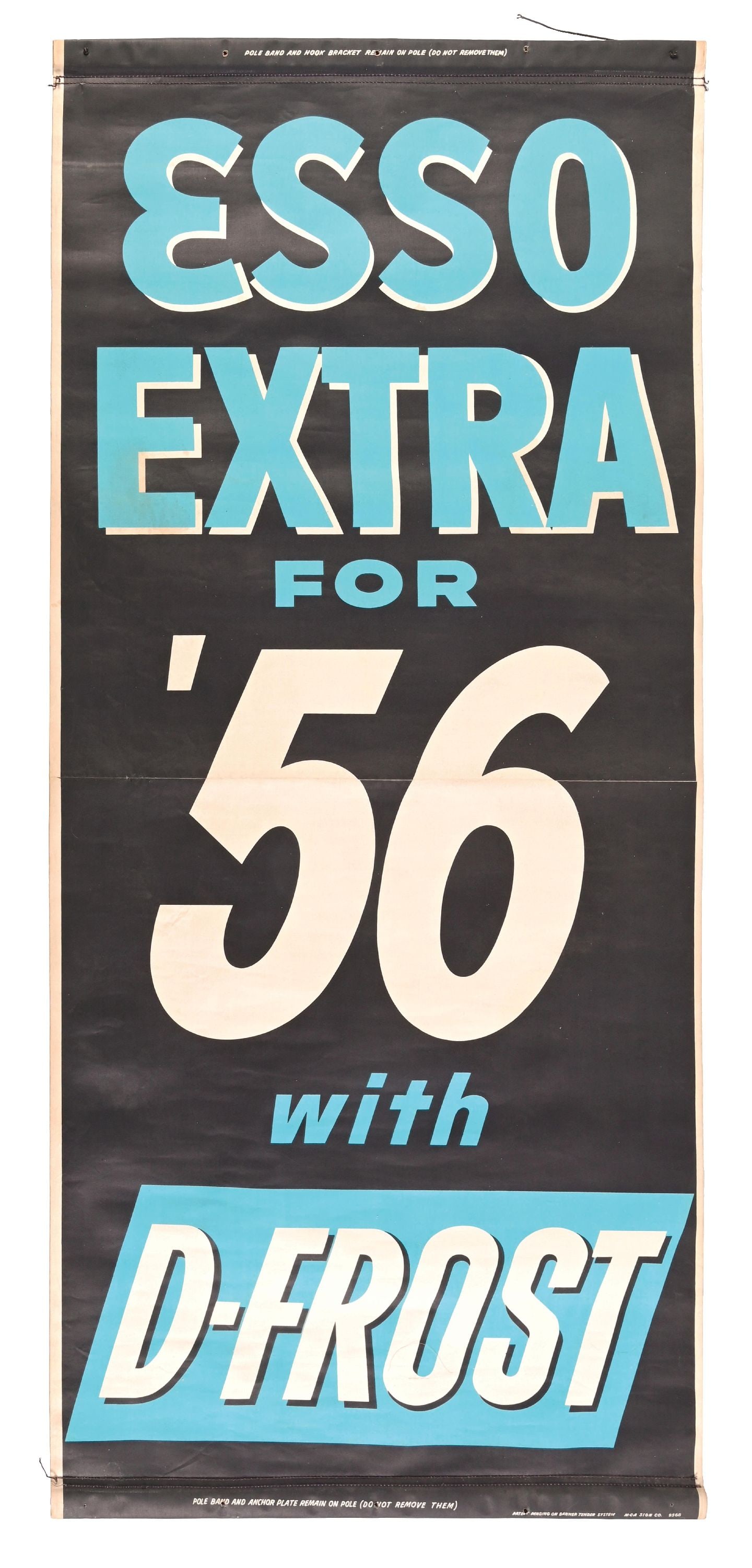 ESSO EXTRA FOR '56 WITH D-FROST ADVERTISING SERVICE STATION BANNER: Single-Sided Banner. C. 1950s. Maker marked M.C.A. CONDITION: Overall excellent, showing light general wear as well as some age staining. Banner shows original wood bracing at the top and bottom, show